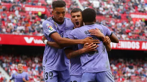 SEVILLE, SPAIN - MAY 27: Rodrygo of Real Madrid celebrates with teammates Alvaro Rodriguez and Dani Ceballos after scoring the team's second goal during the LaLiga Santander match between Sevilla FC and Real Madrid CF at Estadio Ramon Sanchez Pizjuan on May 27, 2023 in Seville, Spain. (Photo by Fran Santiago/Getty Images)