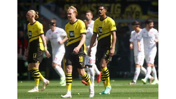 DORTMUND, GERMANY - MAY 27: Sebastien Haller of Borussia Dortmund reacts after Andreas Hanche-Olsen of 1.FSV Mainz 05 (not pictured) scored their sides first goal during the Bundesliga match between Borussia Dortmund and 1. FSV Mainz 05 at Signal Iduna Park on May 27, 2023 in Dortmund, Germany. (Photo by Alex Grimm/Getty Images)