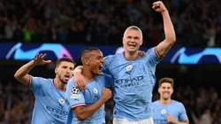 MANCHESTER, ENGLAND - MAY 17: Manuel Akanji celebrates with Erling Haaland of Manchester City after an own goal by Eder Militao of Real Madrid (not pictured) Manchester City's third goal during the UEFA Champions League semi-final second leg match between Manchester City FC and Real Madrid at Etihad Stadium on May 17, 2023 in Manchester, England. (Photo by Michael Regan/Getty Images)