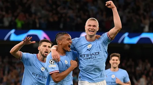 MANCHESTER, ENGLAND - MAY 17: Manuel Akanji celebrates with Erling Haaland of Manchester City after an own goal by Eder Militao of Real Madrid (not pictured) Manchester City's third goal during the UEFA Champions League semi-final second leg match between Manchester City FC and Real Madrid at Etihad Stadium on May 17, 2023 in Manchester, England. (Photo by Michael Regan/Getty Images)