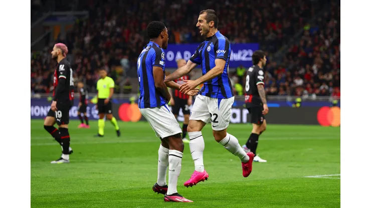 MILAN, ITALY - MAY 10: Henrikh Mkhitaryan of FC Internazionale celebrates after scoring the team's second goal with teammate Denzel Dumfries during the UEFA Champions League semi-final first leg match between AC Milan and FC Internazionale at San Siro on May 10, 2023 in Milan, Italy. (Photo by Clive Rose/Getty Images)