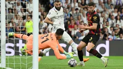 MADRID, SPAIN - MAY 09: Ederson of Manchester City makes a save from Karim Benzema of Real Madrid during the UEFA Champions League semi-final first leg match between Real Madrid and Manchester City FC at Estadio Santiago Bernabeu on May 09, 2023 in Madrid, Spain. (Photo by David Ramos/Getty Images)