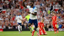 MANCHESTER, ENGLAND - JUNE 19: Bukayo Saka of England celebrates after scoring the team's fifth goal and his third during the UEFA EURO 2024 qualifying round group C match between England and North Macedonia at Old Trafford on June 19, 2023 in Manchester, England. (Photo by Justin Setterfield/Getty Images)
