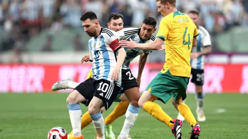 BEIJING, CHINA – JUNE 15: Lionel Messi of Argentina controls the ball against Kye Rowles of Australia during the international friendly match between Argentina and Australia at Workers Stadium on June 15, 2023 in Beijing, China. (Photo by Lintao Zhang/Getty Images)