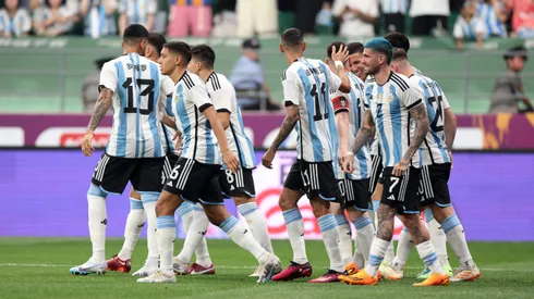 BEIJING, CHINA - JUNE 15: Argentina players celebrate the team's first goal scored by Lionel Messi (obscured) during the international friendly match between Argentina and Australia at Workers Stadium on June 15, 2023 in Beijing, China. (Photo by Lintao Zhang/Getty Images)