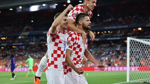 ROTTERDAM, NETHERLANDS - JUNE 14: Bruno Petkovic of Croatia celebrates with teammates after scoring the team's third goal during the UEFA Nations League 2022/23 semifinal match between Netherlands and Croatia at De Kuip on June 14, 2023 in Rotterdam, Netherlands. (Photo by Christof Koepsel/Getty Images)