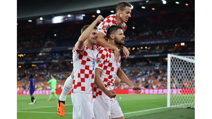 ROTTERDAM, NETHERLANDS - JUNE 14: Bruno Petkovic of Croatia celebrates with teammates after scoring the team's third goal during the UEFA Nations League 2022/23 semifinal match between Netherlands and Croatia at De Kuip on June 14, 2023 in Rotterdam, Netherlands. (Photo by Christof Koepsel/Getty Images)