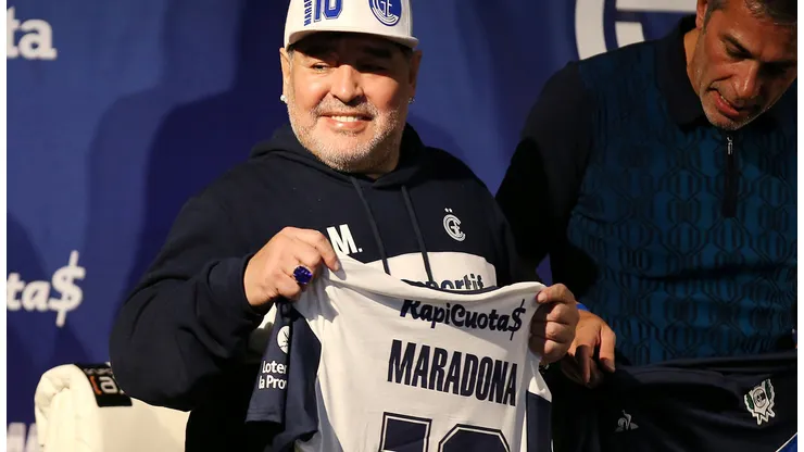 Soccer Football - Argentina - La Plata, Argentina - September 8, 2019 President of Gimnasia y Esgrima Gabriel Pellegrino and Diego Maradona during his presentation as new coach REUTERS/Agustin Marcarian