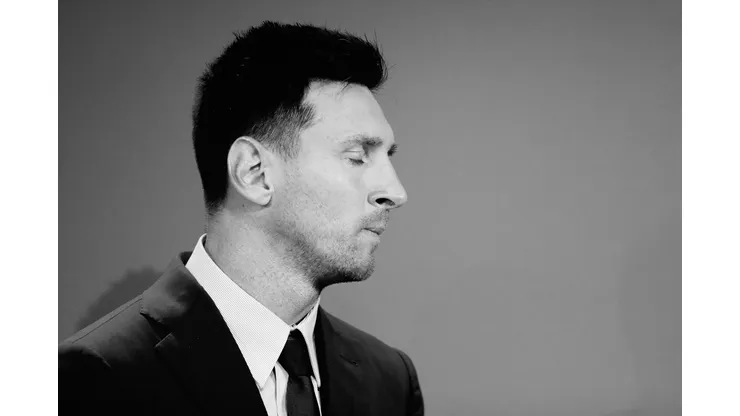 BARCELONA, SPAIN - AUGUST 08: (EDITORS NOTE: Image has been converted to black and white.) Lionel Messi of FC Barcelona faces the media during a press conference at Nou Camp on August 08, 2021 in Barcelona, Spain. (Photo by Eric Alonso/Getty Images)
