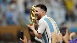 LUSAIL CITY, QATAR - DECEMBER 18: Lionel Messi of Argentina celebrates with the FIFA World Cup Qatar 2022 Winner's Trophy after the team's victory during the FIFA World Cup Qatar 2022 Final match between Argentina and France at Lusail Stadium on December 18, 2022 in Lusail City, Qatar. (Photo by Lars Baron/Getty Images)
