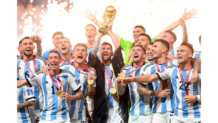 LUSAIL CITY, QATAR - DECEMBER 18: Lionel Messi of Argentina lifts the FIFA World Cup Qatar 2022 Winner's Trophy following the FIFA World Cup Qatar 2022 Final match between Argentina and France at Lusail Stadium on December 18, 2022 in Lusail City, Qatar. (Photo by Dan Mullan/Getty Images)
