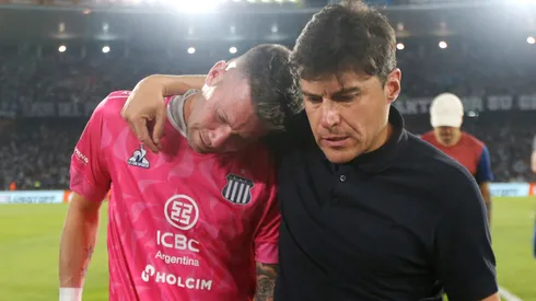 Guido Herrera y Alexander Medina, arquero y DT de Talleres.