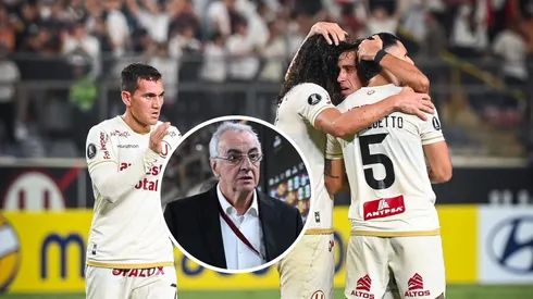 Jugadores de Universitario abrazados.