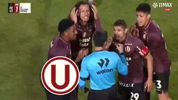 Jugadores de Universitario reclamando a Kevin Ortega.