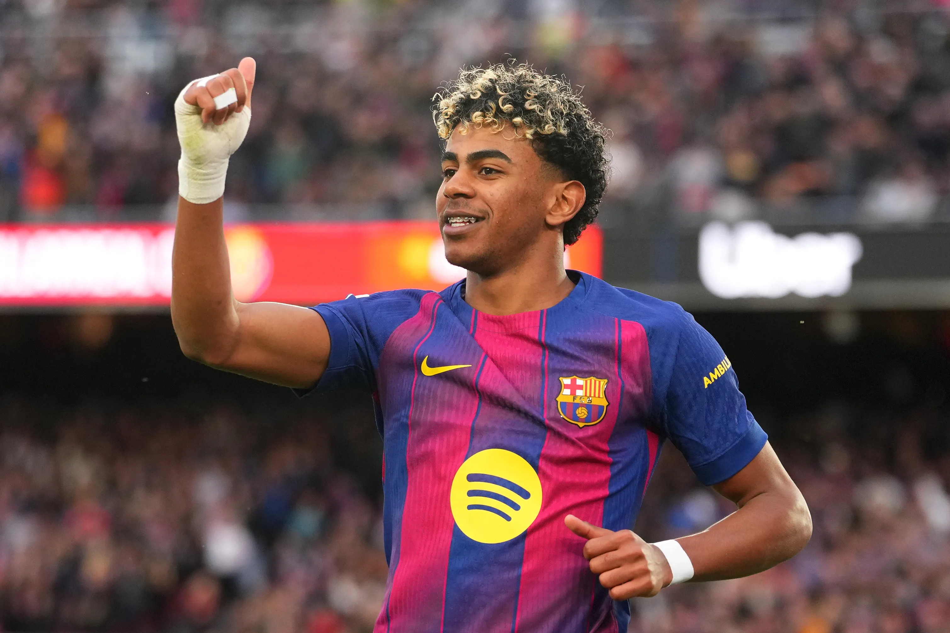BARCELONA, SPAIN - FEBRUARY 28: Lamine Yamal of FC Barcelona celebrates scoring his team's third goal and completing his hat-trick during the LaLiga EA Sports match between FC Barcelona and Villarreal CF at Spotify Camp Nou on February 28, 2026 in Barcelona, Spain. (Photo by Alex Caparros/Getty Images)