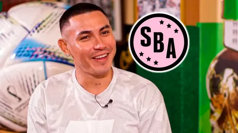 Jean Deza y el escudo del Sport Boys.