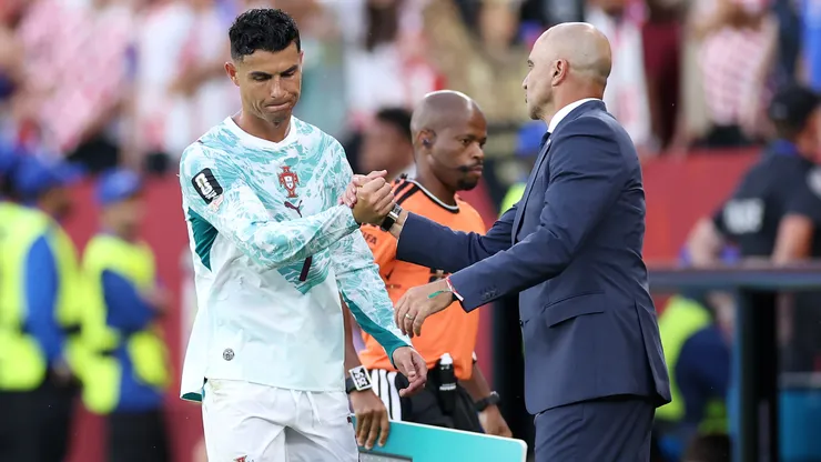 Cristiano Ronaldo junto a Roberto Martínez.