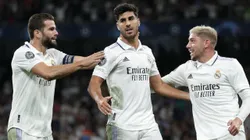 Marco Asensio, rodeado por Valverde y Nacho en un partido del Madrid.