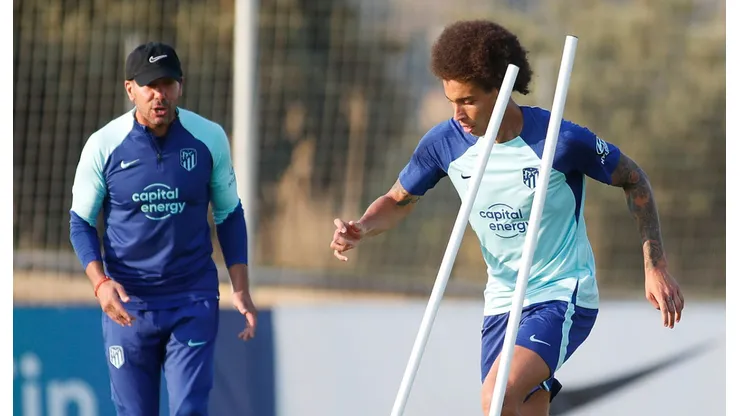Diego Simeone y Axel Witsel.