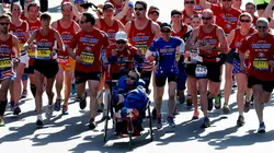 BOSTON, MA - APRIL 21: Team Hoyt crosses the finish line of the 118th Boston Marathon on April 21, 2014 in Boston, Massachusetts. (Photo by Jim Rogash/Getty Images)