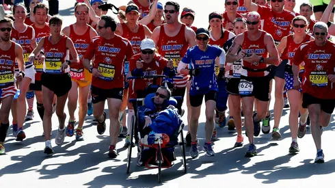 BOSTON, MA - APRIL 21: Team Hoyt crosses the finish line of the 118th Boston Marathon on April 21, 2014 in Boston, Massachusetts. (Photo by Jim Rogash/Getty Images)