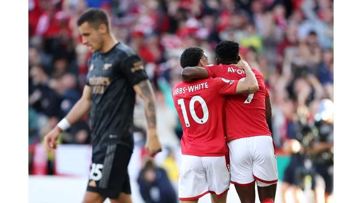 NOTTINGHAM, ENGLAND - MAY 20: Taiwo Awoniyi celebrates with Morgan Gibbs-White of Nottingham Forest after scoring the team's first goal during the Premier League match between Nottingham Forest and Arsenal FC at City Ground on May 20, 2023 in Nottingham, England. (Photo by Catherine Ivill/Getty Images)