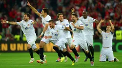 TURIN, ITALY - MAY 14: Sevilla players celebrate after Kevin Gameiro of Sevilla scores the winning penalty in the shoot out during the UEFA Europa League Final match between Sevilla FC and SL Benfica at Juventus Stadium on May 14, 2014 in Turin, Italy. (Photo by Jamie McDonald/Getty Images)