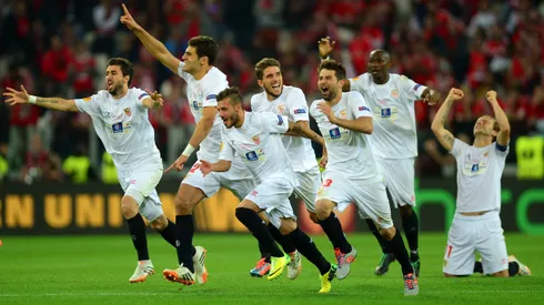 TURIN, ITALY - MAY 14: Sevilla players celebrate after Kevin Gameiro of Sevilla scores the winning penalty in the shoot out during the UEFA Europa League Final match between Sevilla FC and SL Benfica at Juventus Stadium on May 14, 2014 in Turin, Italy. (Photo by Jamie McDonald/Getty Images)
