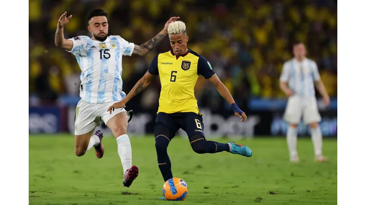 GUAYAQUIL, ECUADOR - MARCH 29: Byron Castillo of Ecuador fights for the ball with Nicolás González of Argentina during the FIFA World Cup Qatar 2022 qualification match between Ecuador and Argentina at Estadio Monumental Banco Pichincha on March 29, 2022 in Guayaquil, Ecuador. (Photo by Jose Jacome - Pool/Getty Images)