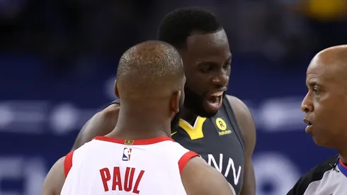 Chris Paul y Draymond Green.