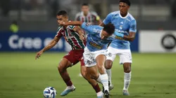 LIMA, PERU - APRIL 05: Jesus Pretell of Sporting Cristal fights for the ball with André of Fluminense during a Copa CONMEBOL Libertadores 2023 group D match between Sporting Cristal and Fluminense at Estadio Nacional de Lima on April 05, 2023 in Lima, Peru. (Photo by Daniel Apuy/Getty Images)