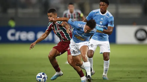 LIMA, PERU - APRIL 05: Jesus Pretell of Sporting Cristal fights for the ball with André of Fluminense during a Copa CONMEBOL Libertadores 2023 group D match between Sporting Cristal and Fluminense at Estadio Nacional de Lima on April 05, 2023 in Lima, Peru. (Photo by Daniel Apuy/Getty Images)