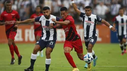 LIMA, PERU - APRIL 04: Josepmir Ballon of Alianza Lima fights for the ball with Tomas Cuello of Athletico Paranaense during a Copa CONMEBOL Libertadores group G match between Alianza Lima and Athletico Paranaense at Estadio Alejandro Villanueva on April 4, 2023 in Lima, Peru. (Photo by Daniel Apuy/Getty Images)