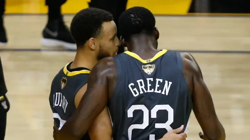 Stephen Curry y Draymond Green.