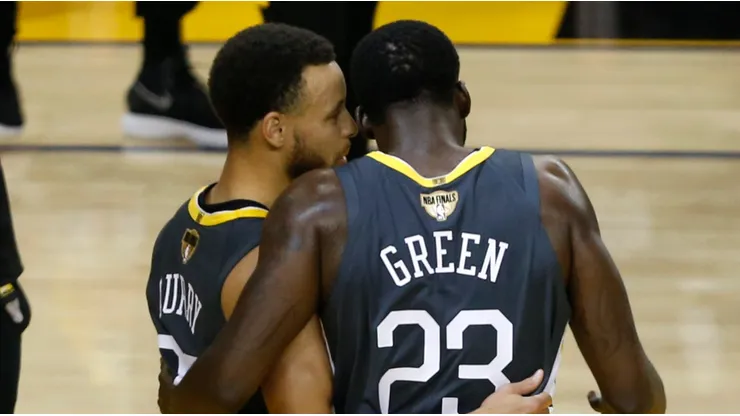 Stephen Curry y Draymond Green.