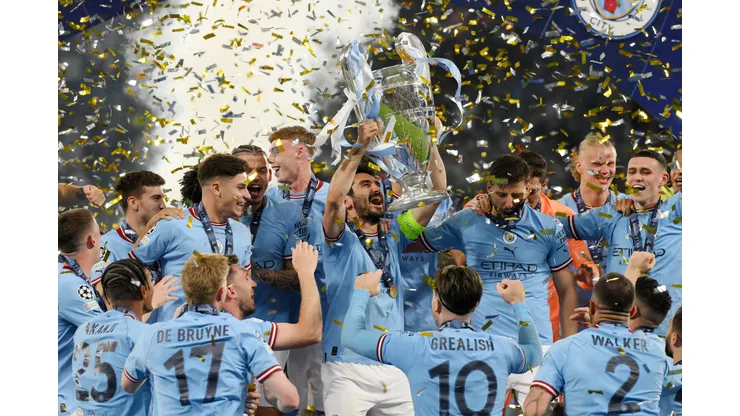 ISTANBUL, TURKEY - JUNE 10: Ilkay Guendogan of Manchester City lifts the UEFA Champions League trophy after the team's victory during the UEFA Champions League 2022/23 final match between FC Internazionale and Manchester City FC at Atatuerk Olympic Stadium on June 10, 2023 in Istanbul, Turkey. (Photo by David Ramos/Getty Images)