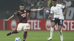 SAO PAULO, BRAZIL - JULY 11: Rodrigo Ureña (L) of Universitario fights for the ball against Felipe Augusto of Corinthians during the first leg of the round of 32 playoff match between Corinthians and Universitario at Neo Quimica Arena on July 11, 2023 in Sao Paulo, Brazil. (Photo by Miguel Schincariol/Getty Images)