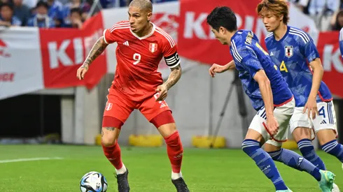 SUITA, JAPAN – JUNE 20: Paolo Guerrero of Peru controls the ball against Shogo Taniguchi of Japan during the international friendly match between Japan and Peru at Panasonic Stadium Suita on June 20, 2023 in Suita, Osaka, Japan. (Photo by Kenta Harada/Getty Images)