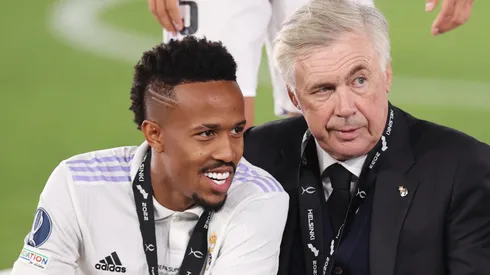 Eder Militao y Carlo Ancelotti.