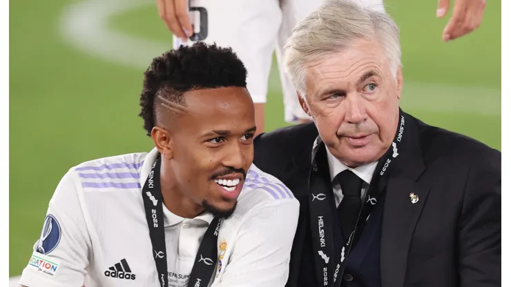 Eder Militao y Carlo Ancelotti.