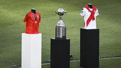 BUENOS AIRES, ARGENTINA - DECEMBER 09: Copa Libertadores trophy and jerseys are displayed on the pitch before the "Copa Eterna" celebrations at Estadio Monumental Antonio Vespucio Liberti on December 9, 2021 in Buenos Aires, Argentina. On the third anniversary of the Copa Libertadores final won against Boca Juniors in Madrid, fans of River Plate gather at their stadium to celebrate. (Photo by Marcelo Endelli/Getty Images)