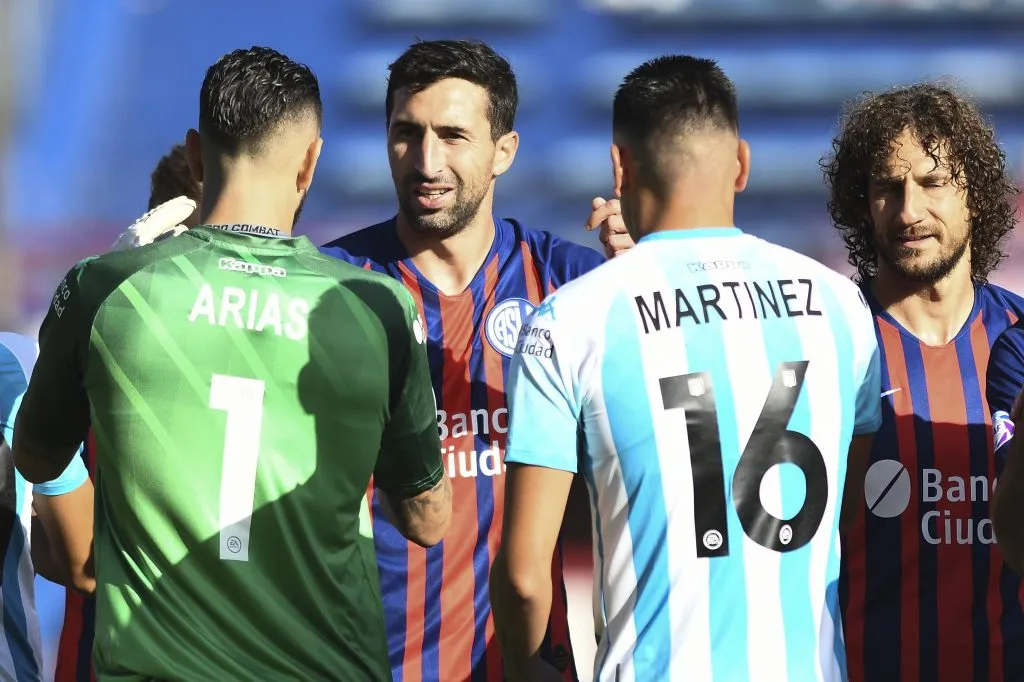 BUENOS AIRES, ARGENTINA – FEBRUARY 22: Alejandro Donatti of San Lorenzo greets former teammates Gabriel Arias and Mauricio Martinez of Racing Club during a match between San Lorenzo and Racing Club as part of Superliga 2019/20 at Estadio Pedro Bidegain on February 22, 2020 in Buenos Aires, Argentina. (Photo by Rodrigo Valle/Getty Images)