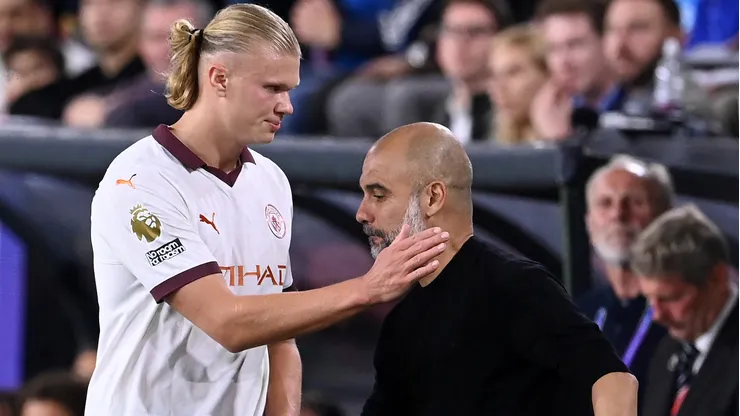 El futbolista noruego anotó un doblete y se llevó el reto de Guardiola.