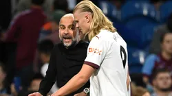 Pep Guardiola y Erling Haaland.