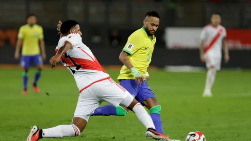 LIMA, PERU – SEPTEMBER 12: Neymar Jr. of Brazil competes for the ball with Jesus Castillo of Peru during a FIFA World Cup 2026 Qualifier match between Peru and Brazil at Estadio Nacional de Lima on September 12, 2023 in Lima, Peru. (Photo by Mariana Bazo/Getty Images)