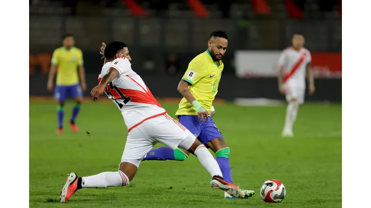 LIMA, PERU - SEPTEMBER 12: Neymar Jr. of Brazil competes for the ball with Jesus Castillo of Peru during a FIFA World Cup 2026 Qualifier match between Peru and Brazil at Estadio Nacional de Lima on September 12, 2023 in Lima, Peru. (Photo by Mariana Bazo/Getty Images)