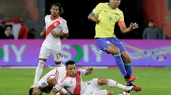LIMA, PERU - SEPTEMBER 12: Casemiro of Brazil competes for the ball with Yoshimar Yotun of Peru during a FIFA World Cup 2026 Qualifier match between Peru and Brazil at Estadio Nacional de Lima on September 12, 2023 in Lima, Peru. (Photo by Mariana Bazo/Getty Images)