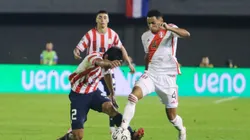 CIUDAD DEL ESTE, PARAGUAY - SEPTEMBER 07: Marcos Lopez of Peru battles for possession with Robert Rojas of Paraguay during a FIFA World Cup 2026 Qualifier match between Paraguay and Peru at Antonio Aranda Stadium on September 07, 2023 in Ciudad del Este, Paraguay. (Photo by Christian Alvarenga/Getty Images)
