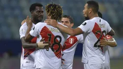 GOIANIA, BRAZIL - JUNE 20: Christian Ramos, André Carrillo and Alexander Callens of Peru celebrate with teammates after their second goal scored by an own goal of Yerry Mina of Colombia (not in frame) during a group B match between Colombia and Peru as part of Copa America Brazil 2021 at Estadio Olimpico on June 20, 2021 in Goiania, Brazil. (Photo by Pedro Vilela/Getty Images)
