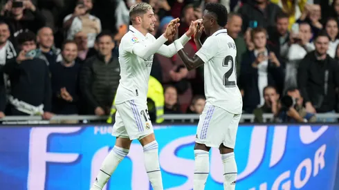 MADRID, SPAIN - OCTOBER 22: Federico Valverde celebrates with Vinicius Junior of Real Madrid after scoring their team's third goal during the LaLiga Santander match between Real Madrid CF and Sevilla FC at Estadio Santiago Bernabeu on October 22, 2022 in Madrid, Spain. (Photo by Angel Martinez/Getty Images)